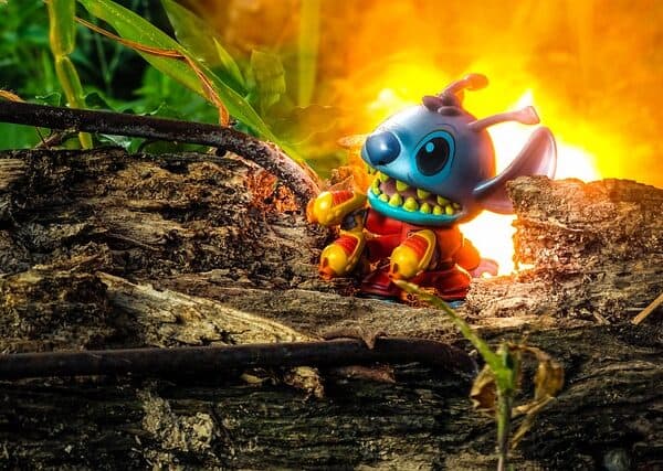 Stitch from Disney Movie 'Lilo & Stitch' against a Disney fire background. | Credit: pixabay.com, luaviles_dgrafico