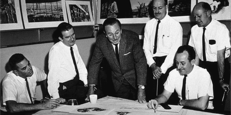 Walt Disney alongside early Imagineers