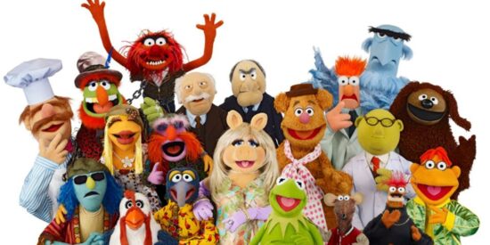 The Muppets gathered together on a white background