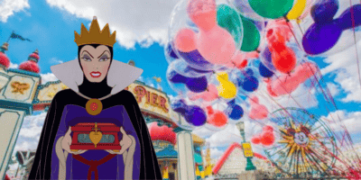 The Evil Queen stands menacingly in front of Pixar Pier at Disneyland Resort.