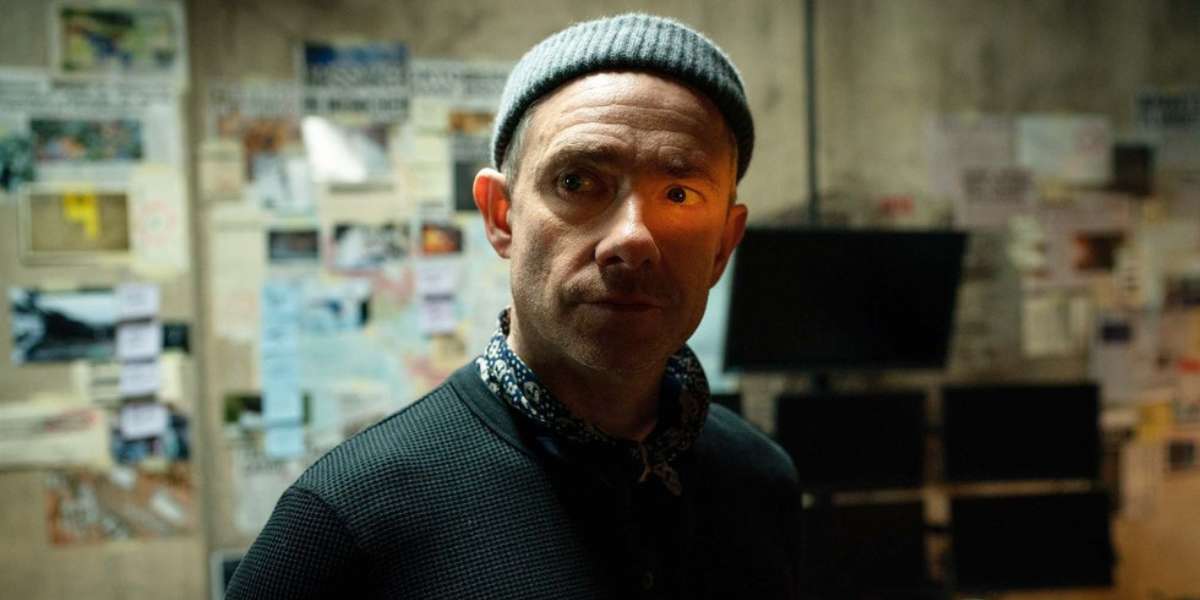 Martin Freeman as Everett Ross in 'Secret Invasion' wearing a beanie and partially covered in shadow