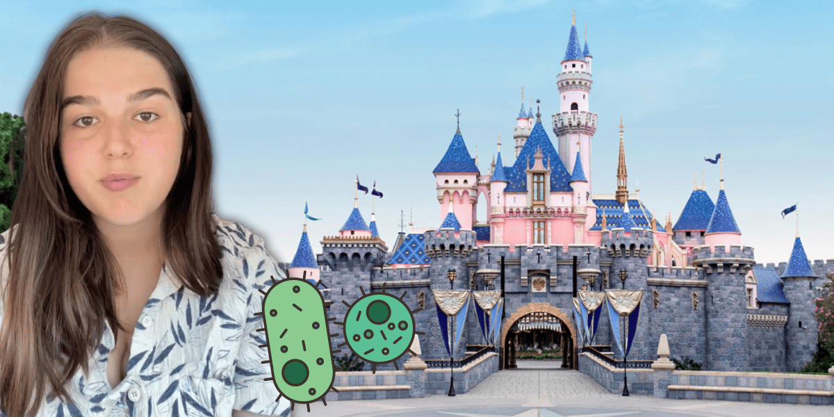In front of the Disneyland castle, a person with long brown hair is edited next to drawn images of green bacteria.