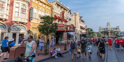 Guests walking down Main Street, U.S.A. in Walt Disney World Resort