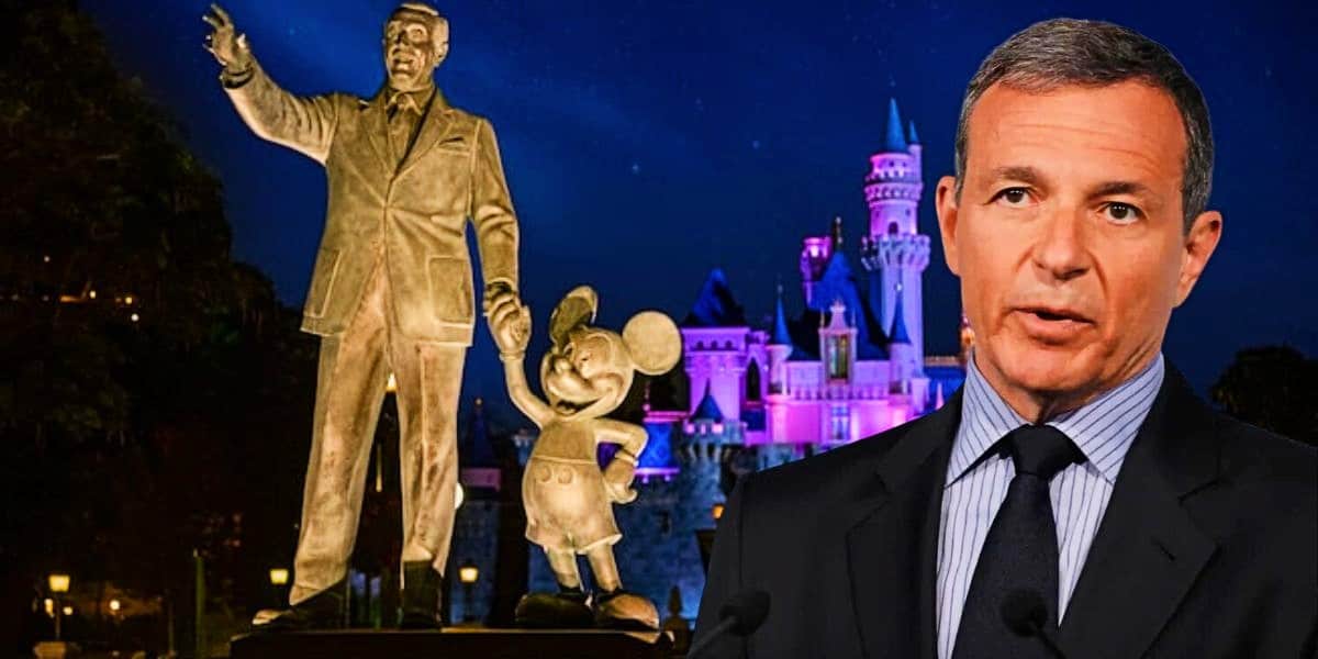 Bob Iger with the Walt Disney and Mickey statue at Disneyland