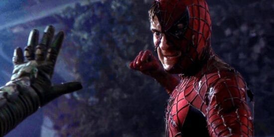 Tobey Maguire fighting Green Goblin in a damaged Spider-Man suit