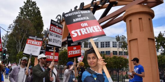 Writers picketing in front of the entrance of Walt Disney Company Writers Strike, WGA Strike
