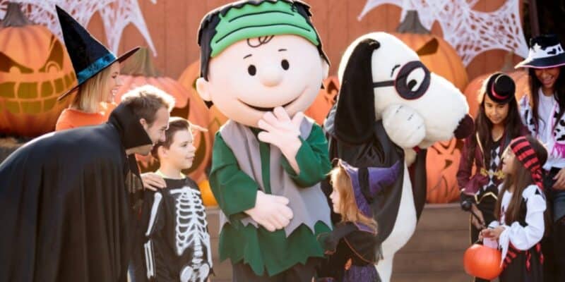 Charlie Brown as Frankenstein's Monster and Snoopy in a mask at Knott's Spooky Farm