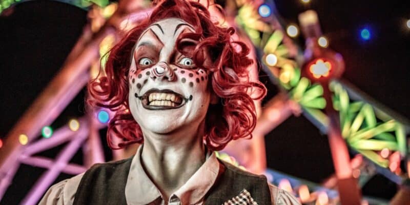 A clown girl smiling at the Carnevil section of Knott's Scary farm