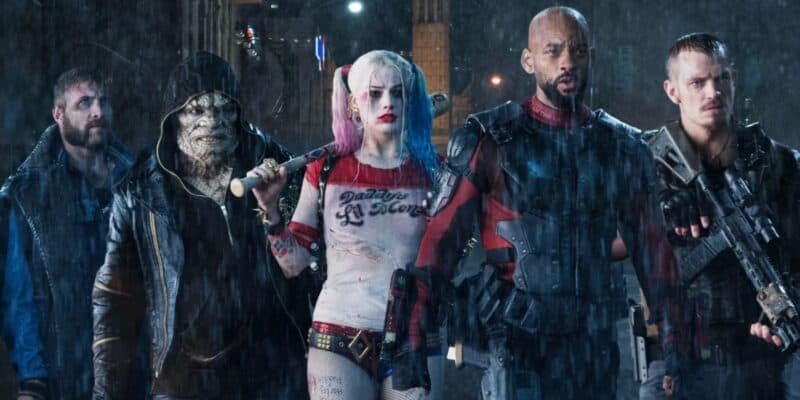 The cast of Suicide Squad 2016 walking through the rain