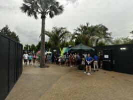 Cast Members waiting in line with their Guests to enter the new Moana-inspired experience inside of EPCOT