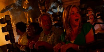 Guests ride Revenge of the Mummy: The Ride