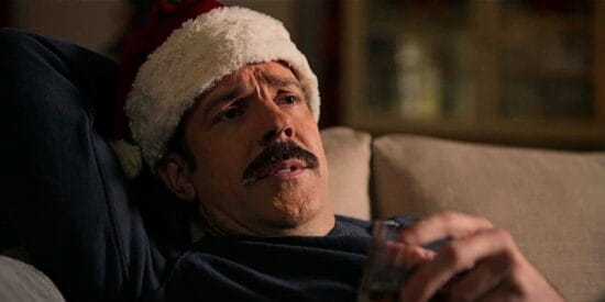 Jason Sudeikis as Ted Lasso in a Santa hat