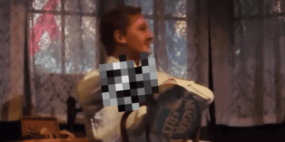 John Progress's hand snaps off in a censored image from a video on the Carousel of Progress.