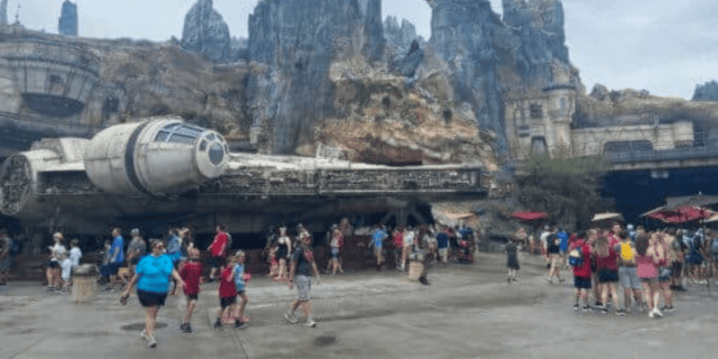 A lull in Walt Disney World crowds, with only a few Guests standing outside Millennium Falcon: Smuggler's Run.