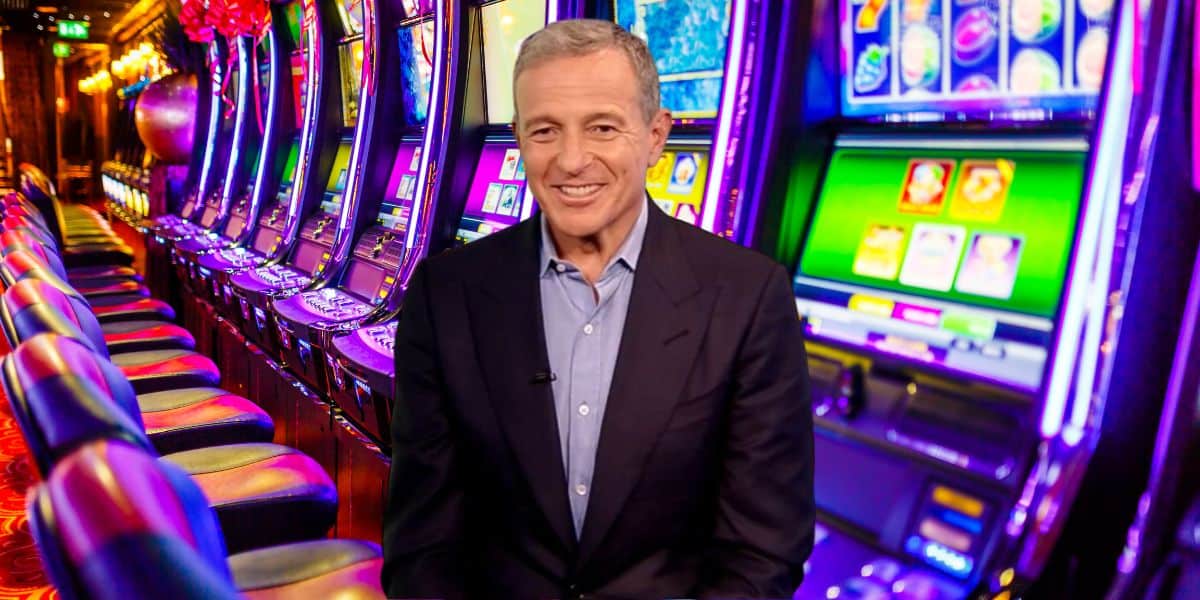 Bob Iger surrounded by slot machines in a casino