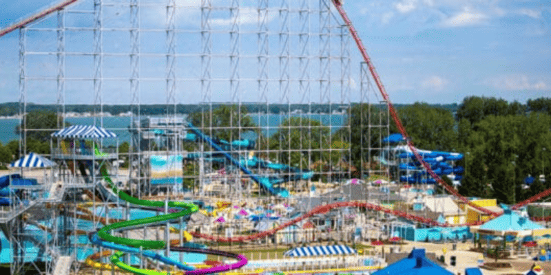 The Magnum XL-200 roller coaster at Cedar Point, pictured from a distance next to some water slides.