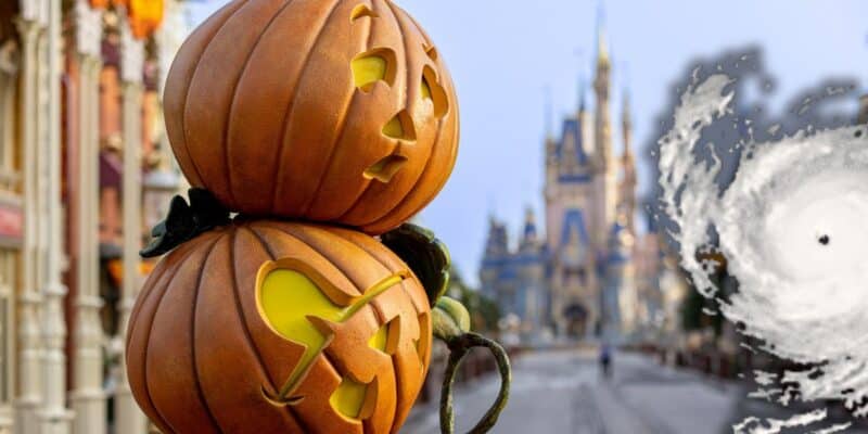 Pumpkins with carvings looking directly at a hurricane with Magic Kingdom in the background