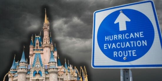 A hurricane evacuation sign with the Magic Kingdom castle and stormy weather in the background