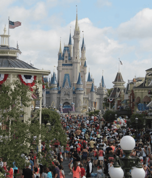 A large crowd photographed at Disney's Magic Kingdom
