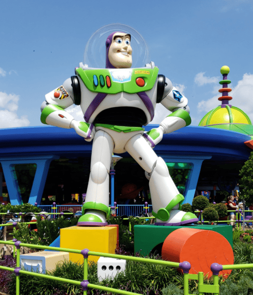 A Buzz Lightyear statue photographed at a theme park