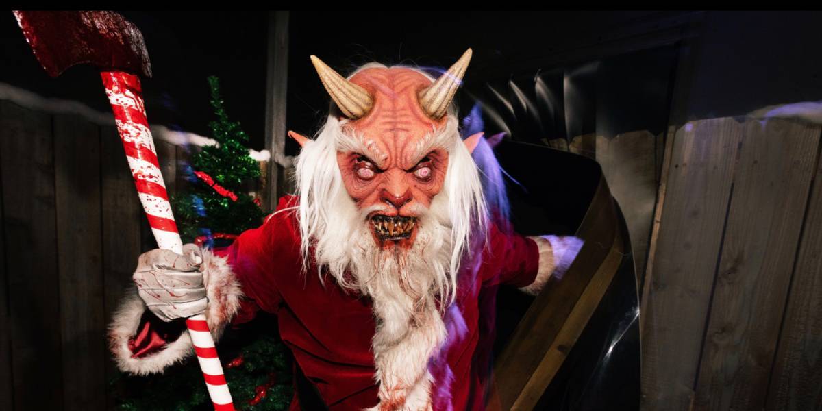 Satan Claus holding onto his trusty candy cane axe in the Holidayz in Hell house