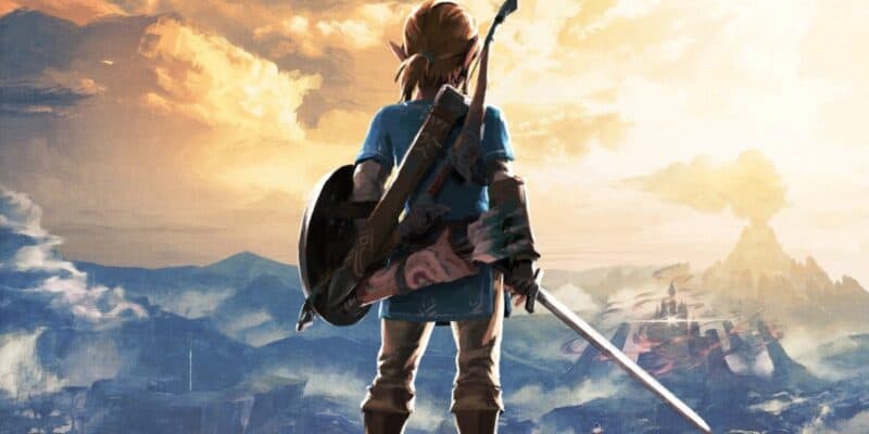 Link holding a sword and shield while looking at the landscape of The Legend of Zelda: Breath of the Wild