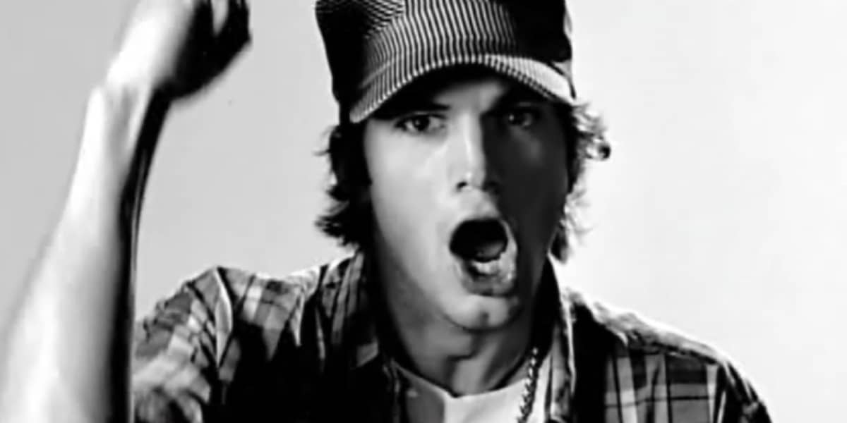 Ashton Kutcher whooping and pumping his fist on punk'd