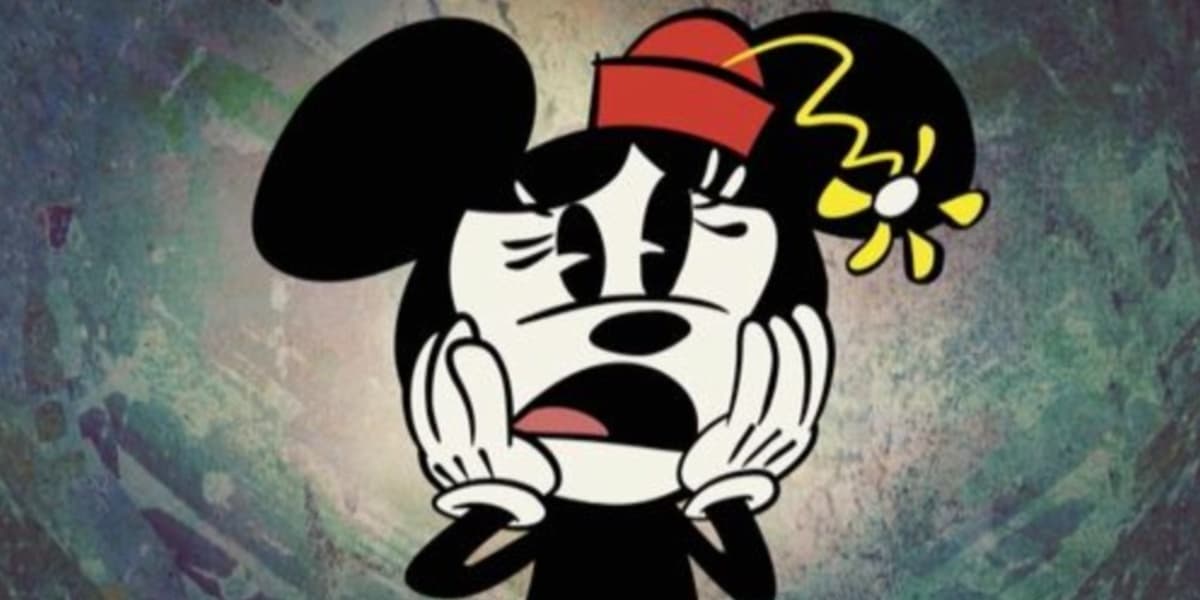 Minnie Mouse upset with her hands on her face