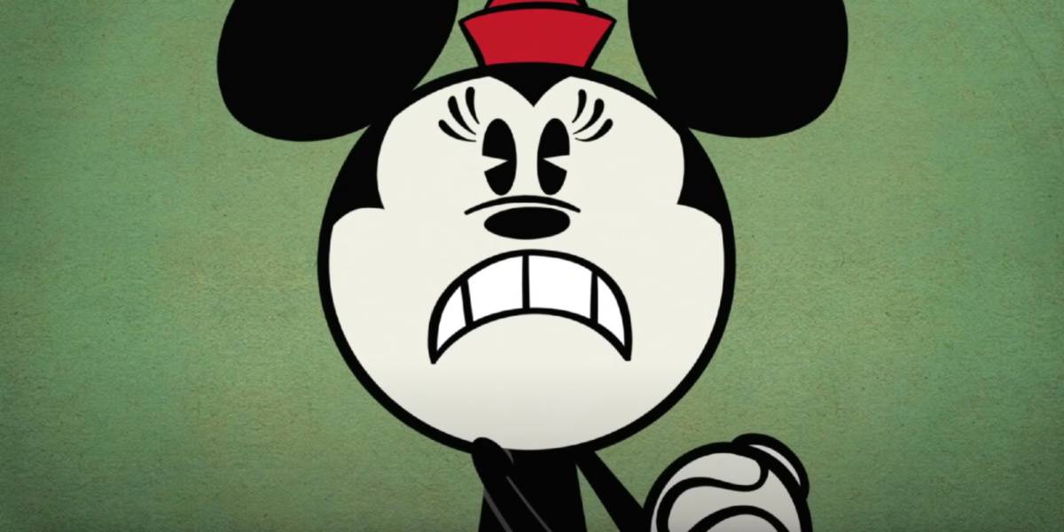 Minnie Mouse frowning on a green background