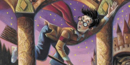 Harry Potter on a broom reaching for the Snitch The Cover for Harry Potter and the Sorcerer's Stone