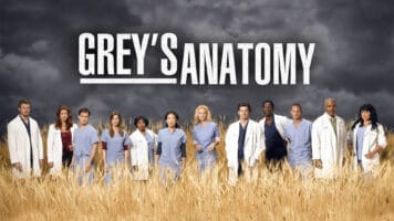 Greys Anatomy poster with cast in field and cloudy sky