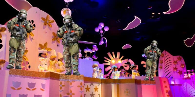 The inside of "it's a small world" at Magic Kingdom Park in Disney World with soldiers standing around wearing gas masks.