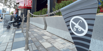 A gray no stroller sign at Disneyland Paris as a Disney strollers crackdown begins.