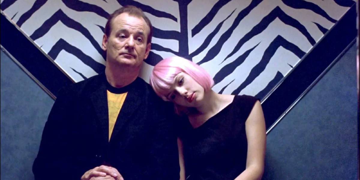 Scarlett Johansson resting her head on Bill Murray's shoulder in Lost in Translation