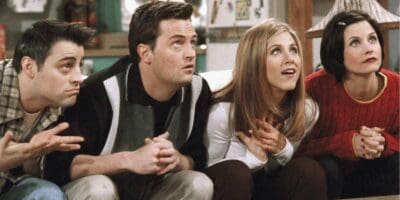 Joey, Chandler, Rachel, and Monica looking up in anticipation on Friends