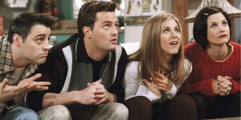 Joey, Chandler, Rachel, and Monica looking up in anticipation on Friends