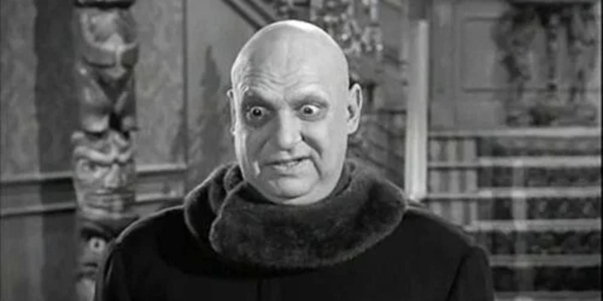 Uncle Fester (Jackie Coogan) twisting his face in The Addams Family sitcom