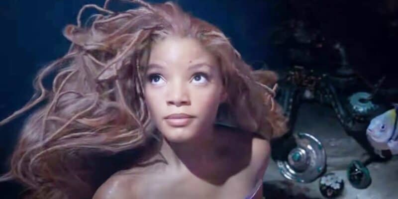 Halle Bailey gazing upwards as Ariel in 'The Little Mermaid'