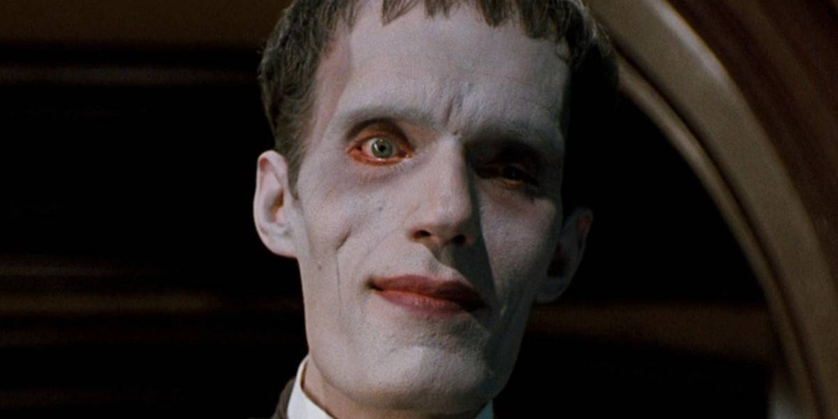 Lurch (Carel Struycken) smiling in The Addams Family (1991)