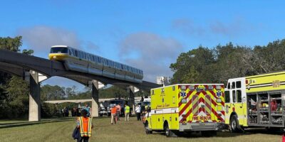 Guests evacuate a Walt Disney World Monorail train car.