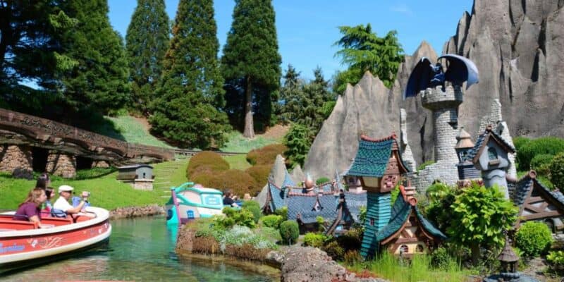 Guests pass a scene on the Storybook Canal Boats (Le Pays des Contes de Fées) in Disneyland Paris