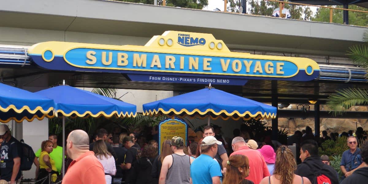 Guests gather around the entrance to Finding Nemo Submarine Voyage