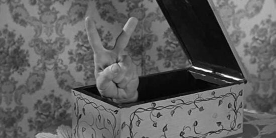 Thing giving the peace sign in The Addams Family sitcom