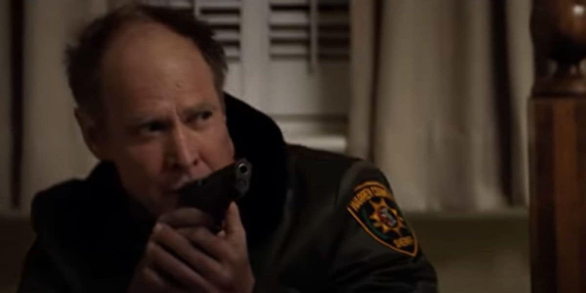 Officer Frank Hawkins (Will Patton) looking for Michael Myers in 'Halloween' (2018)