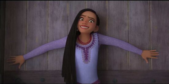 Asha from Disney's 'Wish' standing in front of a door