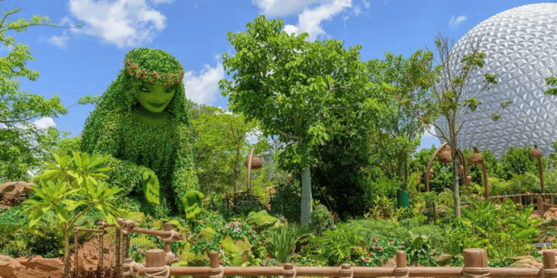 Te Fiti Statue with Spaceship Earth in the background at EPCOT in the new Disney attraction, Journey of Water Inspired by Moana