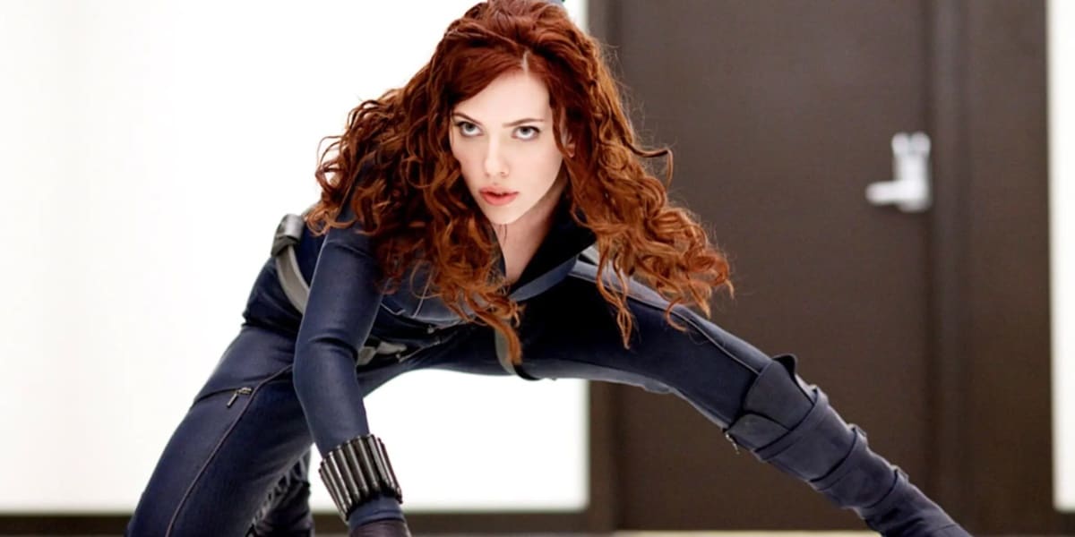 Black Widow in her traditional three-point pose