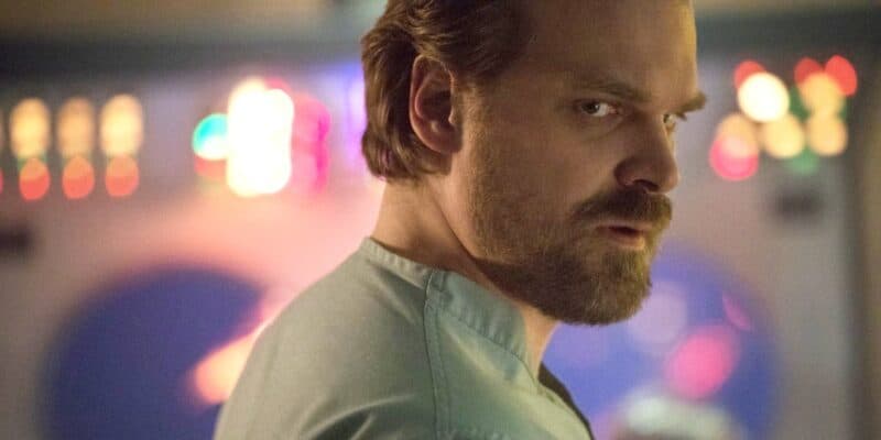 David Harbour looking over his shoulder in Stranger Things