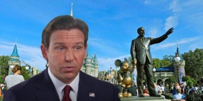 Governor Ron DeSantis looking surprised by the Walt and Mickey statue at Disney World