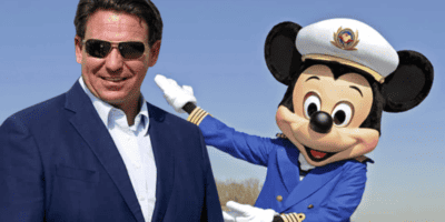 Ron DeSantis wearing sunglasses with Captain Mickey